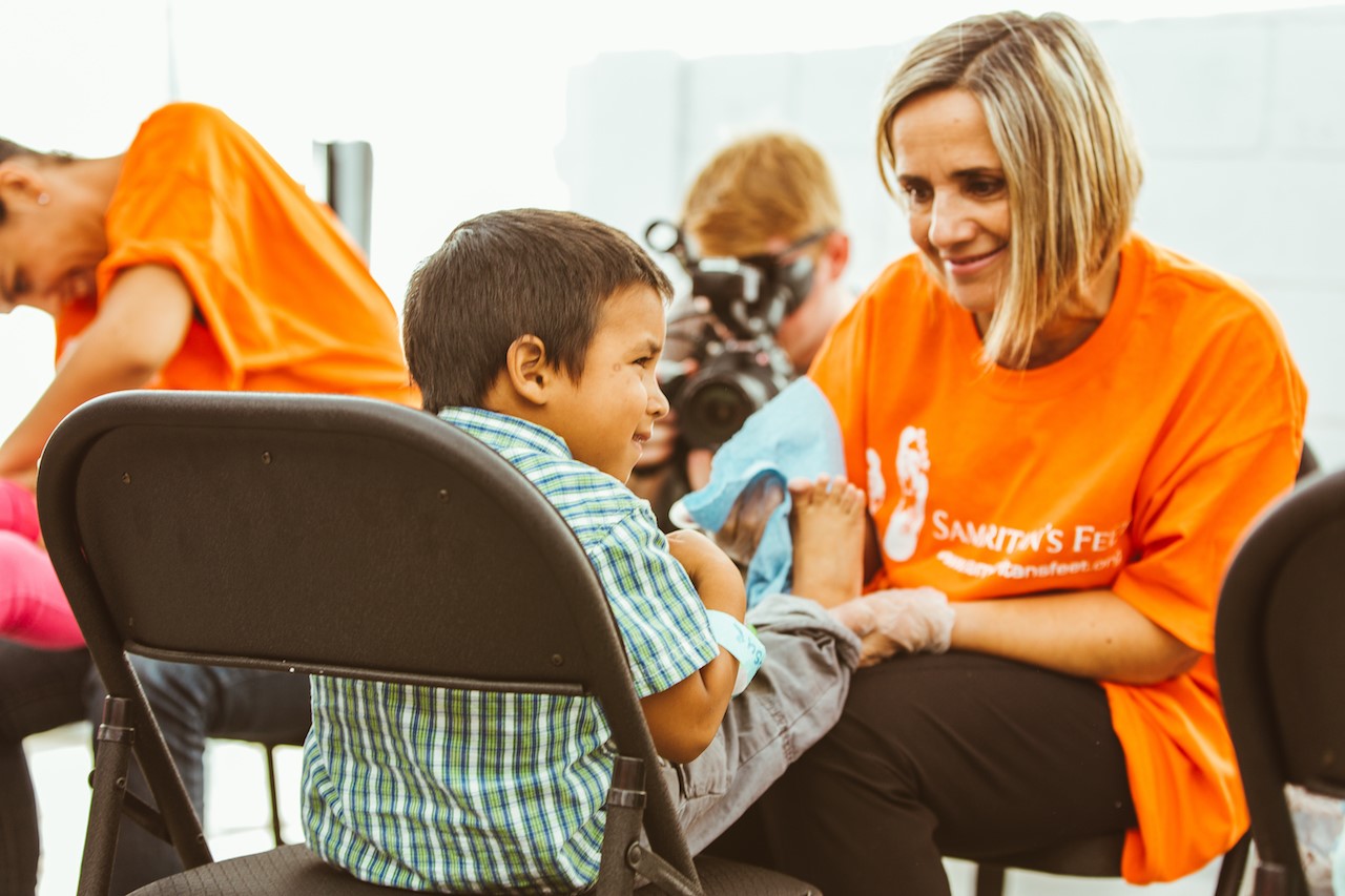 In Tijuana, Movement's own deliver shoes, seeds of hope