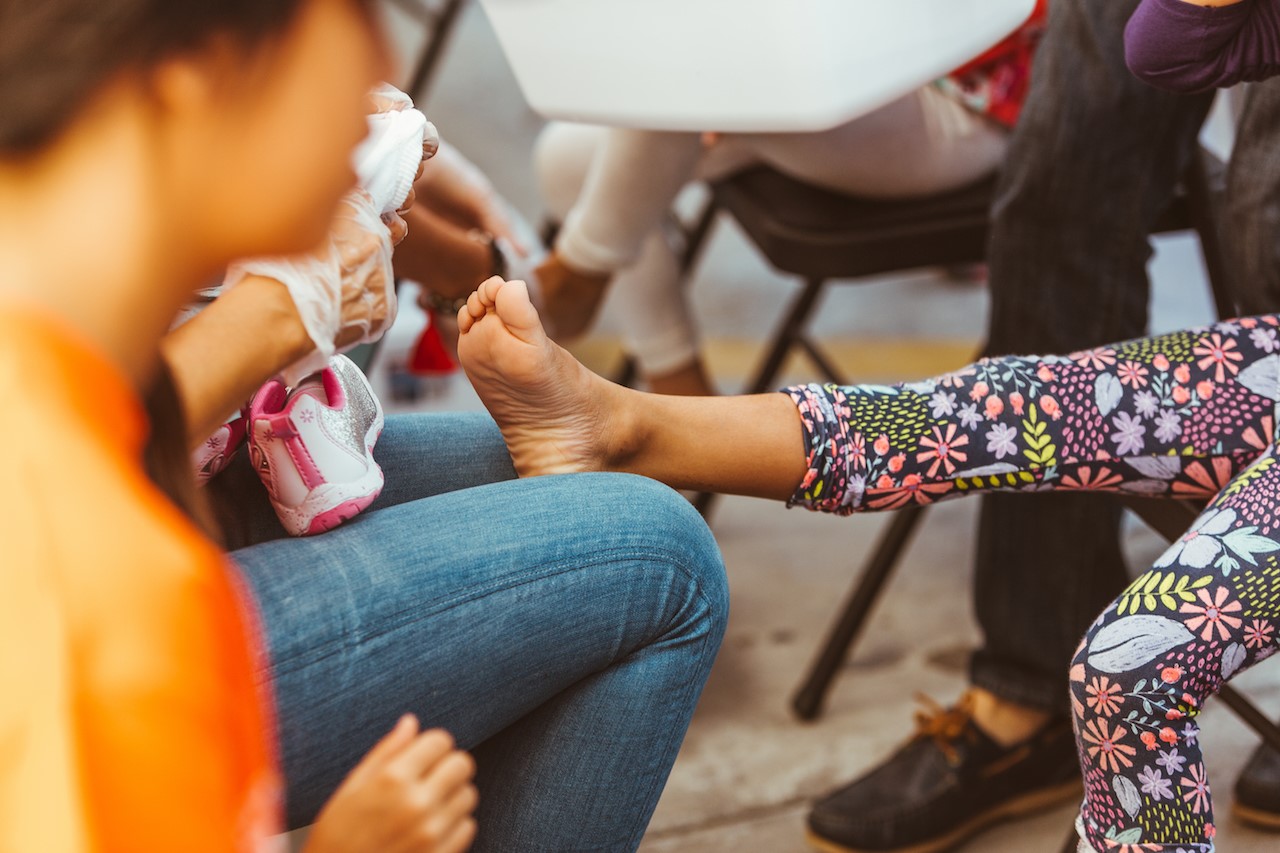 In Tijuana, Movement's own deliver shoes, seeds of hope