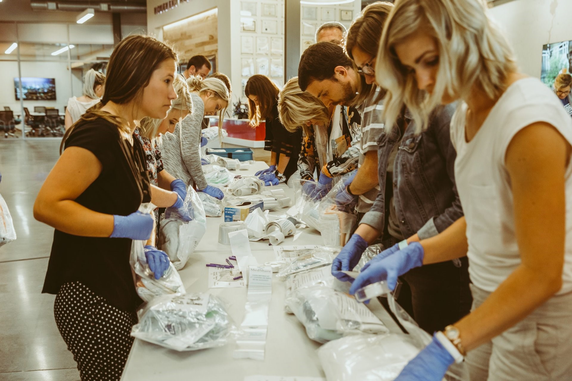 Movement Mortgage raises $15,830 and packs 1,000 Clean Birthing Kits