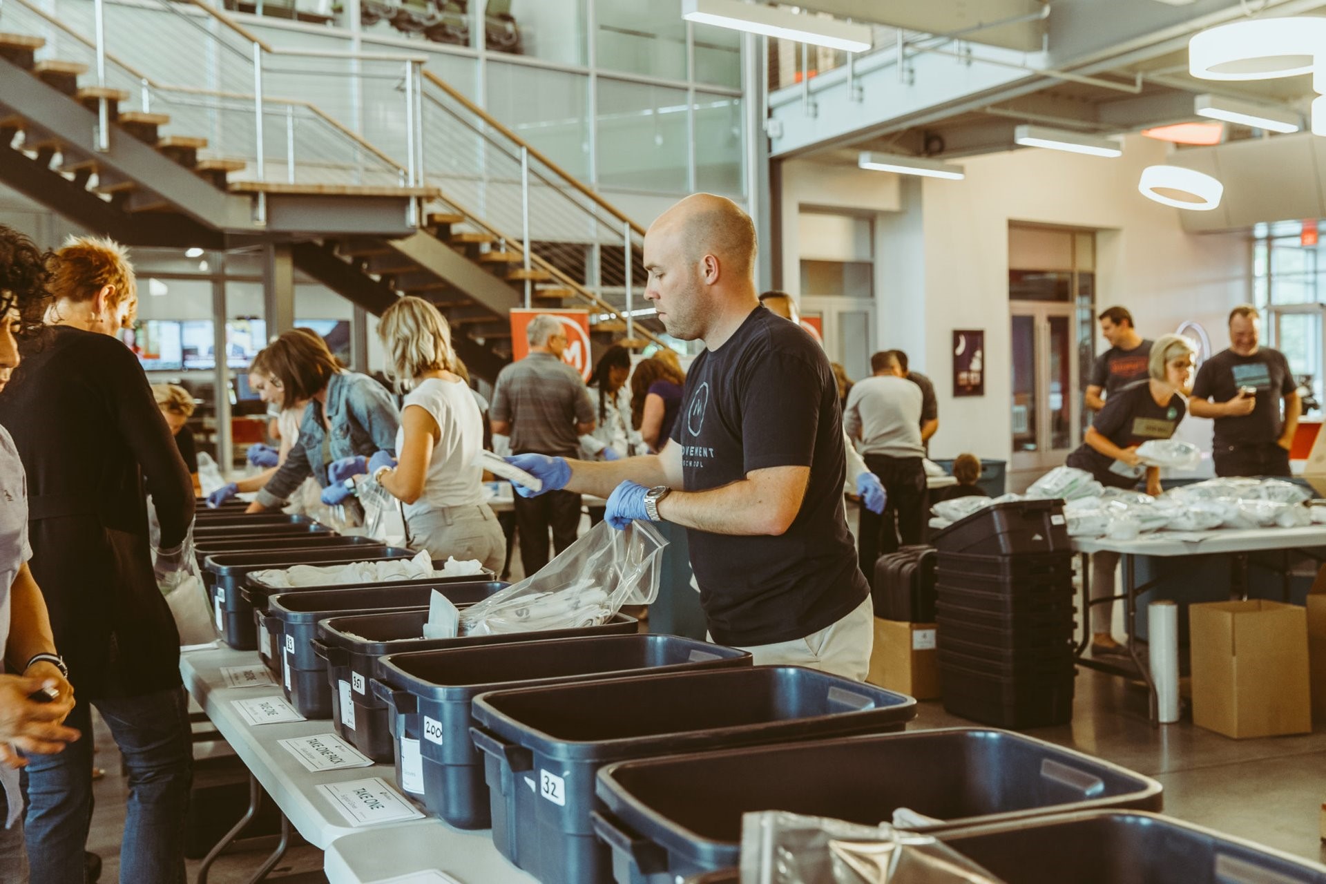 Movement Mortgage raises $15,830 and packs 1,000 Clean Birthing Kits